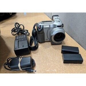 2003 Canon Optura Camcorder Bundle With Two Batteries & Charger With Dc Coupler